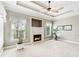 Bright living room features a fireplace, white trim, and lots of light at 2041 Democracy Dr, Buford, GA 30519