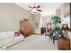 Bright living room with high ceilings, a decorative cabinet, and comfortable seating at 2041 Democracy Dr, Buford, GA 30519