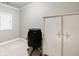 Office space with neutral walls, a swivel chair, and a white armoire at 2041 Democracy Dr, Buford, GA 30519