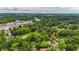 Beautiful aerial view of the property nestled among lush greenery with other buildings in the distance at 232 S Candler St, Villa Rica, GA 30180