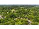 Scenic aerial view of the property amidst verdant trees and neighborhood residences, showing the landscape at 232 S Candler St, Villa Rica, GA 30180
