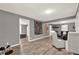 Spacious living area with wood floors and views to other rooms at 232 S Candler St, Villa Rica, GA 30180
