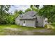 Back exterior view showcasing siding, backyard space, and access to the outdoors at 232 S Candler St, Villa Rica, GA 30180