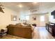 Finished basement with a comfortable seating area and mounted tv at 310 Hillpine Dr, Woodstock, GA 30189