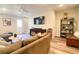 Finished basement with a comfortable seating area and a mounted tv at 310 Hillpine Dr, Woodstock, GA 30189