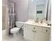 Bathroom with shower and tub combination with white cabinets at 310 Hillpine Dr, Woodstock, GA 30189
