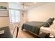 Cozy bedroom offers a comfortable space with neutral decor and ample natural light at 310 Hillpine Dr, Woodstock, GA 30189