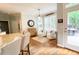 Cozy breakfast nook features ample natural light, stylish decor and access to the patio at 310 Hillpine Dr, Woodstock, GA 30189