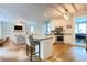 Open kitchen with an island, granite countertops and modern stainless steel appliances at 310 Hillpine Dr, Woodstock, GA 30189
