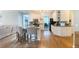 Spacious kitchen with a center island, stainless steel appliances, and hardwood floors at 310 Hillpine Dr, Woodstock, GA 30189