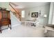 Inviting living room with desk, hardwood floors and a staircase at 310 Hillpine Dr, Woodstock, GA 30189