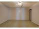 Bedroom with ceiling fan and neutral decor, and carpeting at 3870 Michaels Creek Ct, Loganville, GA 30052