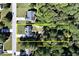 Aerial view of property showcasing lot lines and surrounding lush greenery at 540 Windermere Dr, Loganville, GA 30052