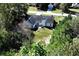 Charming backyard featuring a well-maintained lawn, fire pit, and an inviting patio for outdoor relaxation at 540 Windermere Dr, Loganville, GA 30052