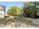 Enjoy the expansive backyard with a playset, perfect for outdoor activities at 540 Windermere Dr, Loganville, GA 30052