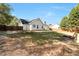 The backyard features a fenced yard and plenty of space for outdoor fun and entertainment at 540 Windermere Dr, Loganville, GA 30052