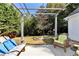 Enjoy your backyard with fire pit, playground, and relaxing seating area under the pergola at 540 Windermere Dr, Loganville, GA 30052