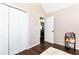 Bedroom with a large closet, overhead lighting, and adjoining rooms at 540 Windermere Dr, Loganville, GA 30052