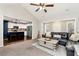 Open-concept living room showcasing modern kitchen features, comfortable seating, and natural light at 540 Windermere Dr, Loganville, GA 30052