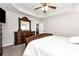 Spacious main bedroom with tray ceiling, ceiling fan, and carpeted flooring at 540 Windermere Dr, Loganville, GA 30052