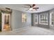 Bedroom with ceiling fan and bay window at 261 Township Dr, Hiram, GA 30141