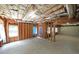 Unfinished basement with exposed ceiling and framed walls, ready for customization at 2892 Motts Cove Holw, Lawrenceville, GA 30043