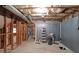 Unfinished basement area with some framed walls, plumbing, and exposed ceiling at 2892 Motts Cove Holw, Lawrenceville, GA 30043