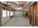 Unfinished basement area featuring framed walls and walkout access at 2892 Motts Cove Holw, Lawrenceville, GA 30043