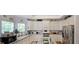 Well-equipped kitchen featuring modern appliances, white cabinetry, and ample counter space at 2892 Motts Cove Holw, Lawrenceville, GA 30043