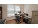 Bright home office space with a large window and ample desk space at 2892 Motts Cove Holw, Lawrenceville, GA 30043