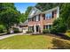 Charming two-story brick home with well-manicured lawn and landscaping at 3174 Vickery Ne Dr, Marietta, GA 30066
