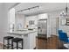 Modern kitchen with granite countertops, stainless steel appliances, and a breakfast bar at 3174 Vickery Ne Dr, Marietta, GA 30066