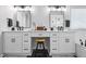 Luxurious main bathroom with double sinks, a makeup vanity, modern mirrors and lighting, and a soaking tub at 3174 Vickery Ne Dr, Marietta, GA 30066