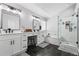 Luxurious main bathroom featuring double vanities, soaking tub, and a glass-enclosed shower at 3174 Vickery Ne Dr, Marietta, GA 30066