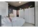 Cozy bedroom showcasing ample closet space, a contemporary design, and a comfortable sleeping area at 3300 Windy Ridge Se Pkwy # 1603, Atlanta, GA 30339