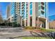 Exterior view of the modern building with a driveway and manicured landscaping at 3300 Windy Ridge Se Pkwy # 1603, Atlanta, GA 30339