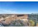 A scenic cityscape view of the surrounding community with multiple office buildings and bright blue skies at 3300 Windy Ridge Se Pkwy # 1603, Atlanta, GA 30339