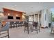Stylish clubhouse featuring a bar with chairs, TVs, and comfortable seating area for entertainment and socializing at 3300 Windy Ridge Se Pkwy # 1603, Atlanta, GA 30339