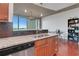 Kitchen showcases granite countertops, stainless steel appliances, and a window with scenic views at 3300 Windy Ridge Se Pkwy # 1603, Atlanta, GA 30339