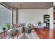 Living room is bright and airy, showcasing modern furniture, large windows, and a concrete ceiling at 3300 Windy Ridge Se Pkwy # 1603, Atlanta, GA 30339