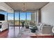 Living room with floor-to-ceiling windows offering amazing views and filled with natural light at 3300 Windy Ridge Se Pkwy # 1603, Atlanta, GA 30339