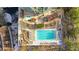 Resort-style condominium complex pool with sun deck, seating areas, and landscaping at 3300 Windy Ridge Se Pkwy # 1603, Atlanta, GA 30339
