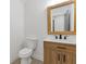 This is a bathroom with a wood cabinet at 4045 White Oak Sw Ln, Lilburn, GA 30047