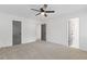Large bedroom featuring new carpet, fresh paint, neutral colors, and filled with natural light at 4045 White Oak Sw Ln, Lilburn, GA 30047