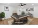 A staged game room with pool table, modern lighting and fresh paint at 4045 White Oak Sw Ln, Lilburn, GA 30047