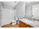 Bathroom featuring a vanity with a marble countertop, a tub, and a toilet at 505 Rendezvous Rd, Acworth, GA 30102