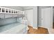 Bedroom featuring bunk beds, wood floors, closet, and access to the hallway at 505 Rendezvous Rd, Acworth, GA 30102