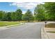 Scenic neighborhood park with mature trees and grassy lawns, perfect for outdoor activities and relaxation at 505 Rendezvous Rd, Acworth, GA 30102