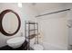 Bathroom with sleek vanity, classic white tiled shower-tub, and modern fixtures at 70 Fairclift Dr, Covington, GA 30016