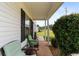 Inviting covered front porch with comfortable seating, offering a relaxing outdoor space at 70 Fairclift Dr, Covington, GA 30016